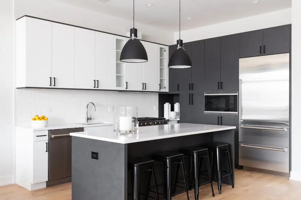 Contemporary kitchen remodel with dark and white cabinets