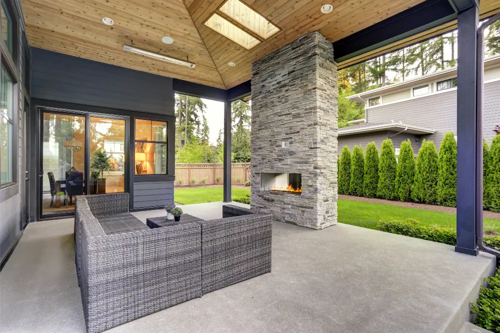 New modern home features a backyard with patio - Dagmar Pros