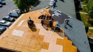 A team of residential roofers installing a new roof in Portland OR.